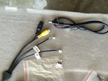 This is a pic of the camera cable.  It has the power and video.  The two labeled wires allow the selection of mirrored or normal viewing and the selection of with or without the green, yellow, red backup lines.