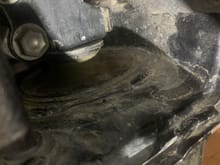 This is the rubber stop on the passenger's side of the transmission - it looks good, no deterioration but can't tell if its supporting the transmission or not. 