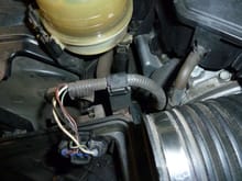 3. You need a long socket extension to reach the bolts for the air box. Note the clip that holds the harness for the O2 sensor. Get that before you yank it out.