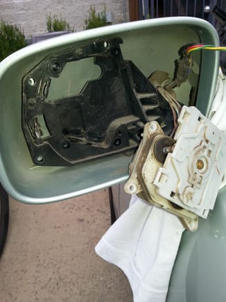 The interior of side-view mirror assembly after removal of mirror and motor. (MUST  use Lexus Service Manual instructions)