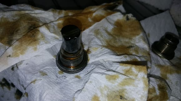 The rear diff magnetic drain plug had a bunch of crud on it.
