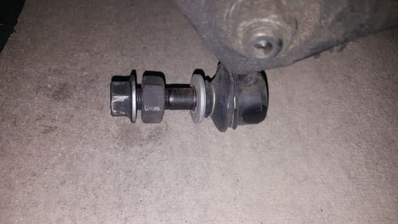 The sway bar end links both had these inside nuts being used as spacers.  They are oversized and do not thread on.  I assume this is not stock.  I haven't looked them up yet.  I have 2 new end links on order.  I'm curious to see the difference.