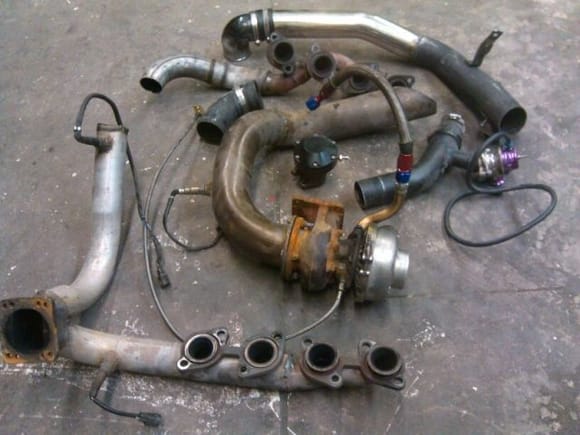Old parts of turbo kit sc400 kept the headers and swaped everything else