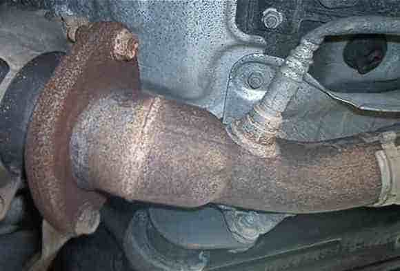 The post catalytic converter oxygen sensor probe is a significant blockage in exhaust stream. This sensor serves only to monitor when catalyst levels fall below certain efficiency. Spark plug anti-fouling spacers could solve this.