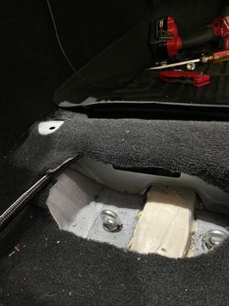 The eye bolts beneath the seats for 6 point attachment 