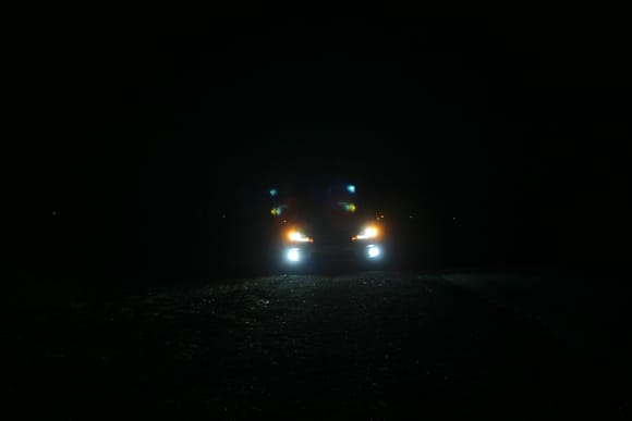 Pic taken outside of the car with emergency flashers on (hence the orange lights).
As you can see the light projected by the LED bulbs (low beam and fog light) were pure white (not bluish/ricey) .