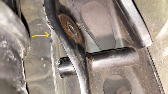 Close up of the lower arrow.  Once 3/16 or so was removed the bolt was able to slide out. 