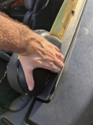 Stick your fingers under the back of the headrests and RIP! No need to be gentle, pops right out.