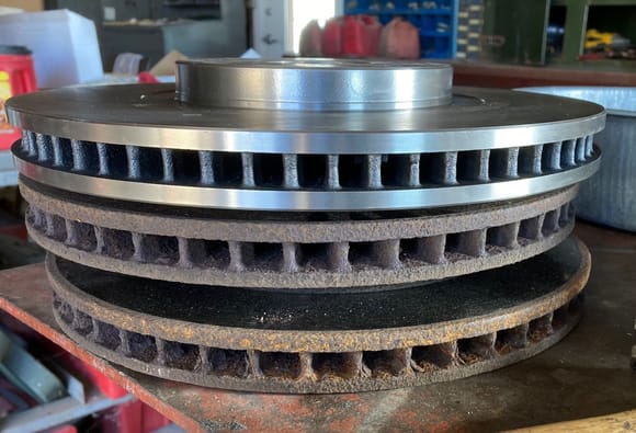 New SuperTT rotor stacked atop old OEM RX330 rotors (~164k miles).   New rotor measures 30.0mm, old rotors ~27.4mm