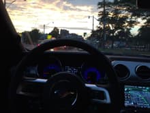 Driving with navigation at dusk
