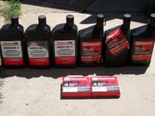 Flushed transmission fluid, power steering fluid and rear end fluid with friction modifier added