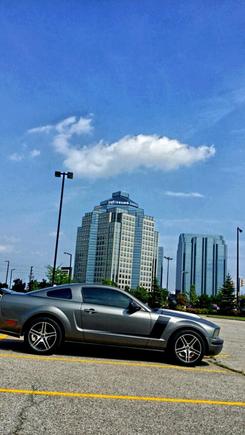 My mustang with city skyline