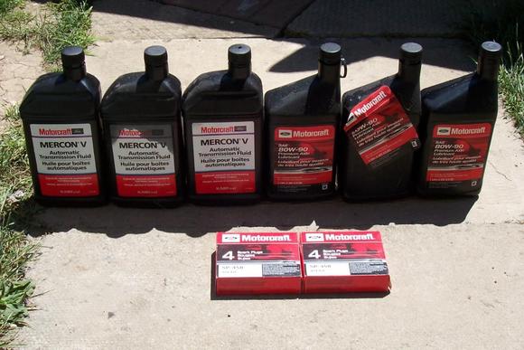 Flushed transmission fluid, power steering fluid and rear end fluid with friction modifier added