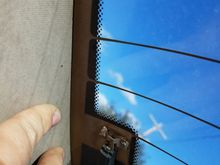 Defroster has a connection like this on each side.  Looks like all the strands run parallel from one side to the other.