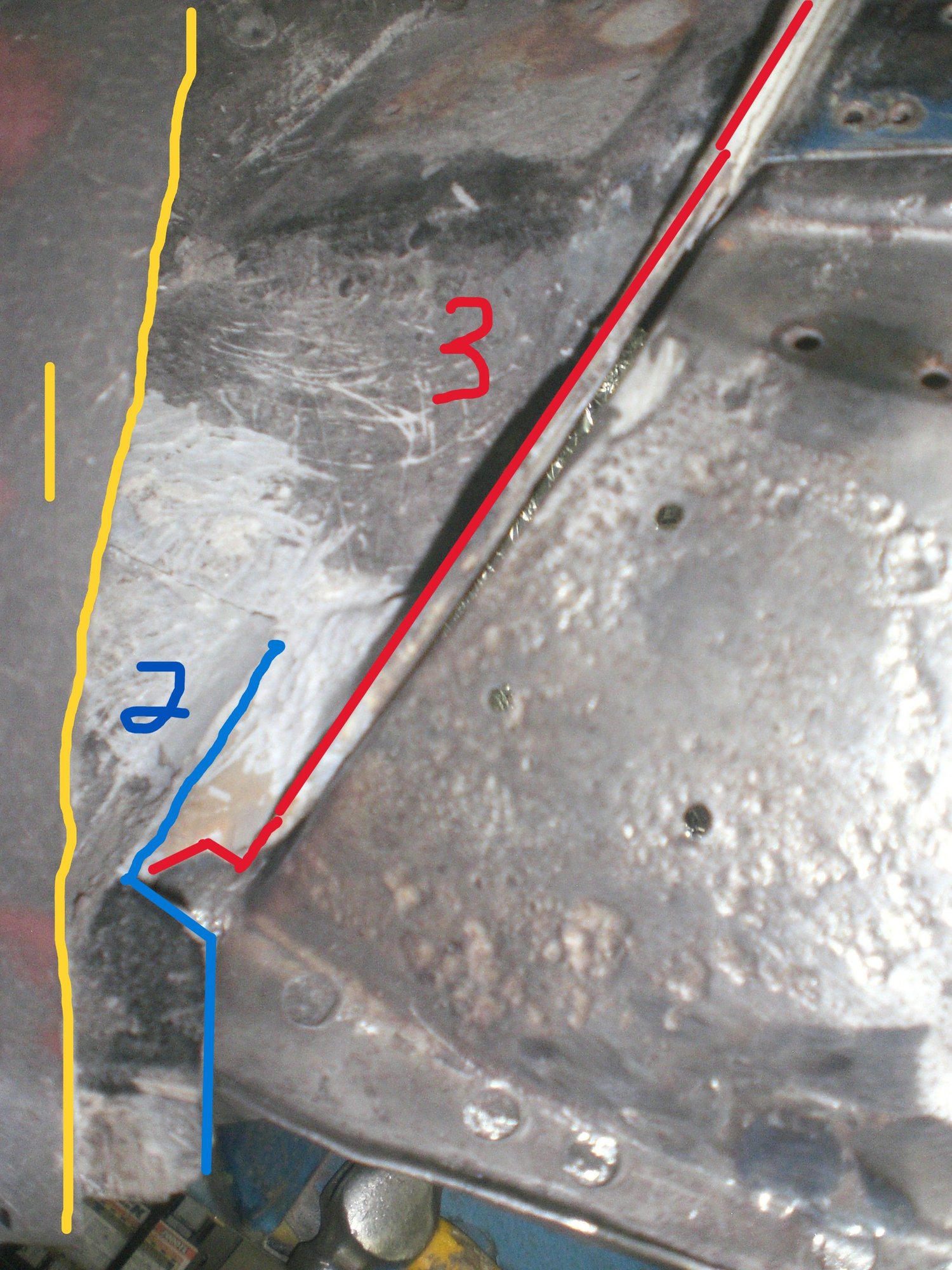 Blue line 2 is where I cut the bonding support piece.  Yellow line 1 is the fender cut.  Red line 3 is the top edhge of the vertical rear portion of the wioer trough.