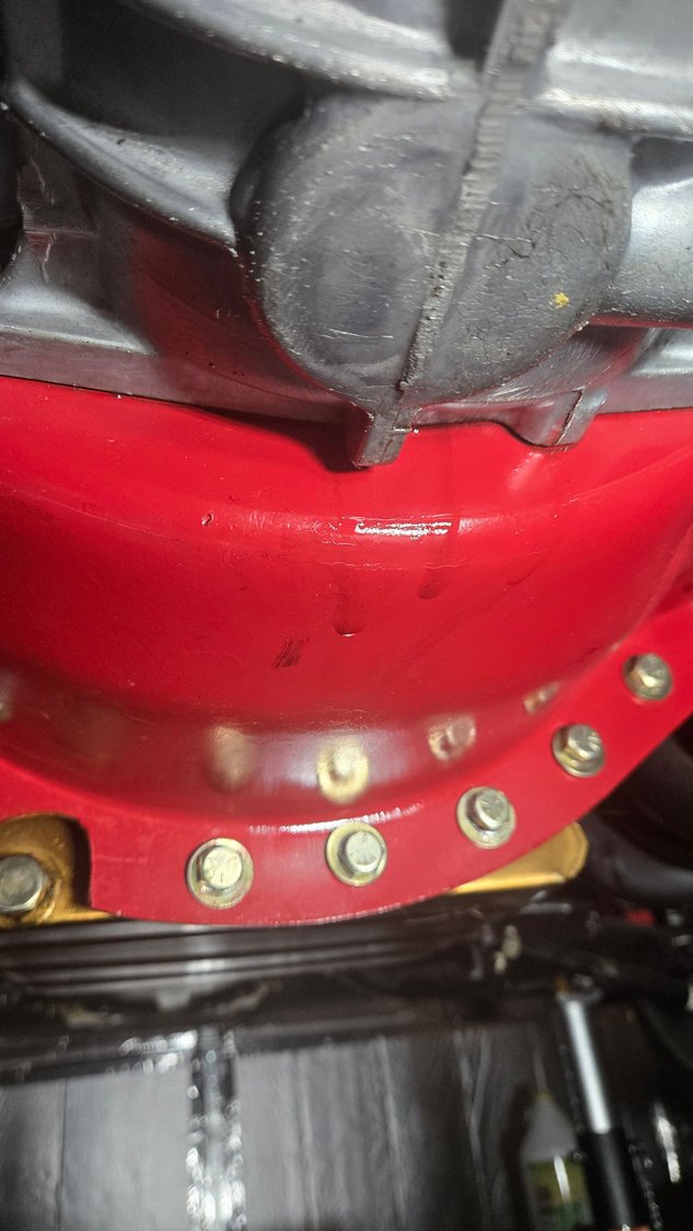 Drips after breaking the bolts loose.