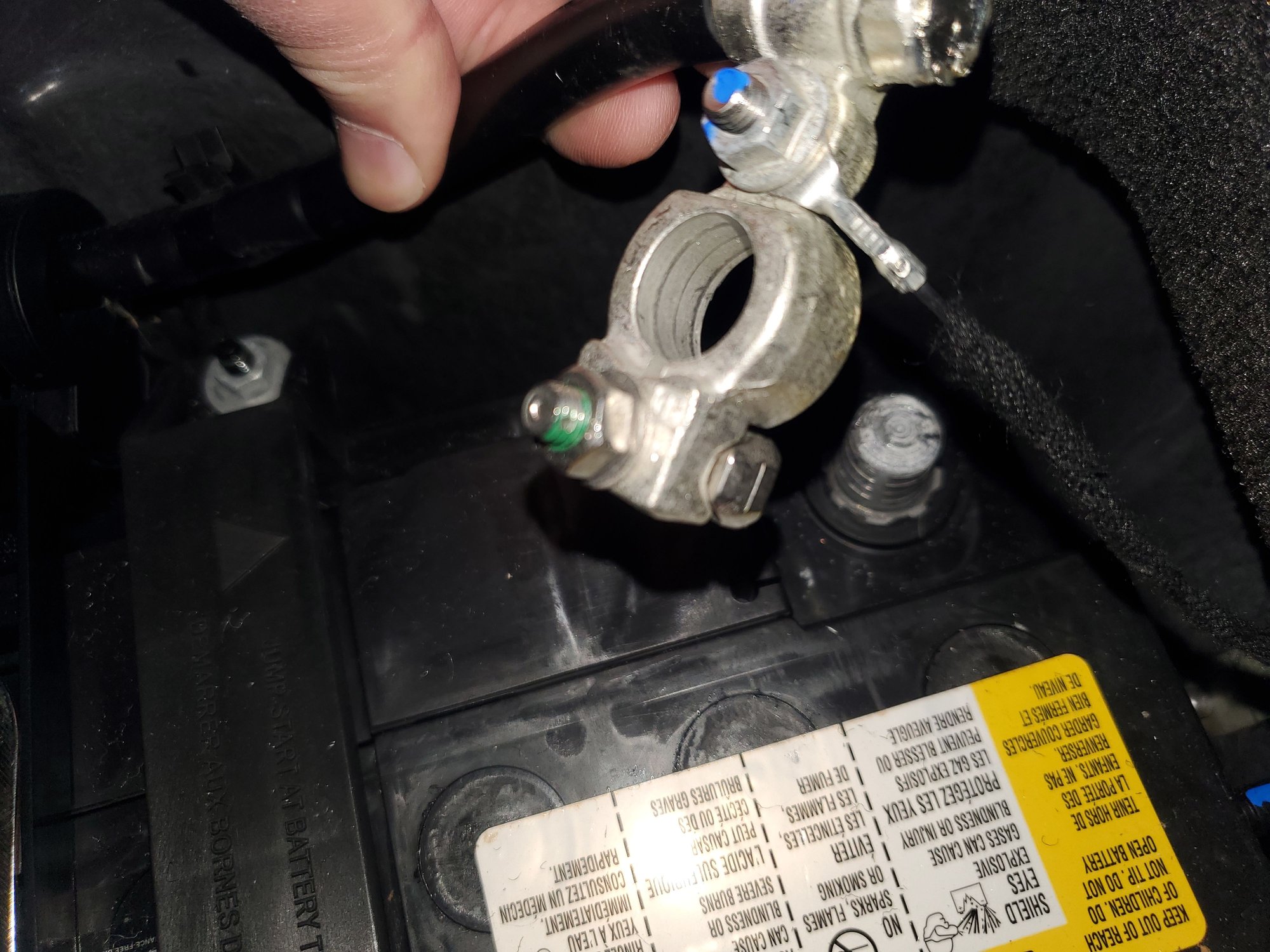 Small black sensing wire connected to negative battery cable.  See blue paint spot.
