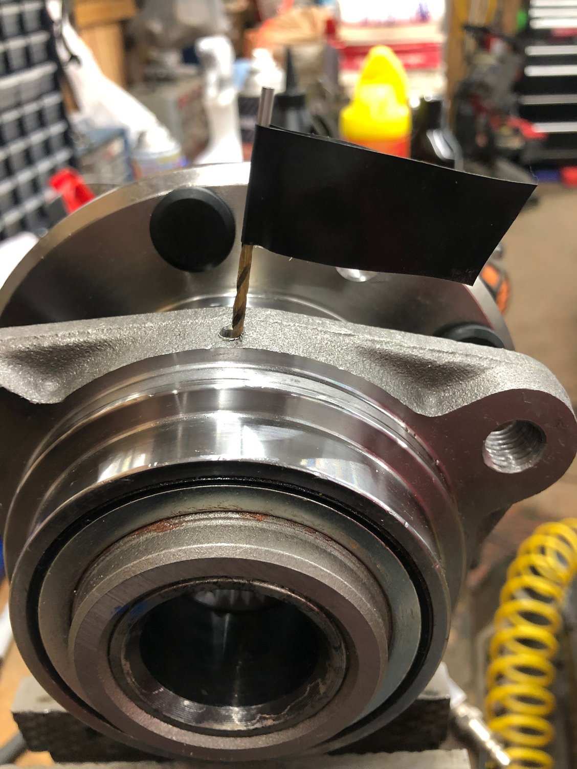 drill hole in wheel bearings to install grease zerk for racing Page 2