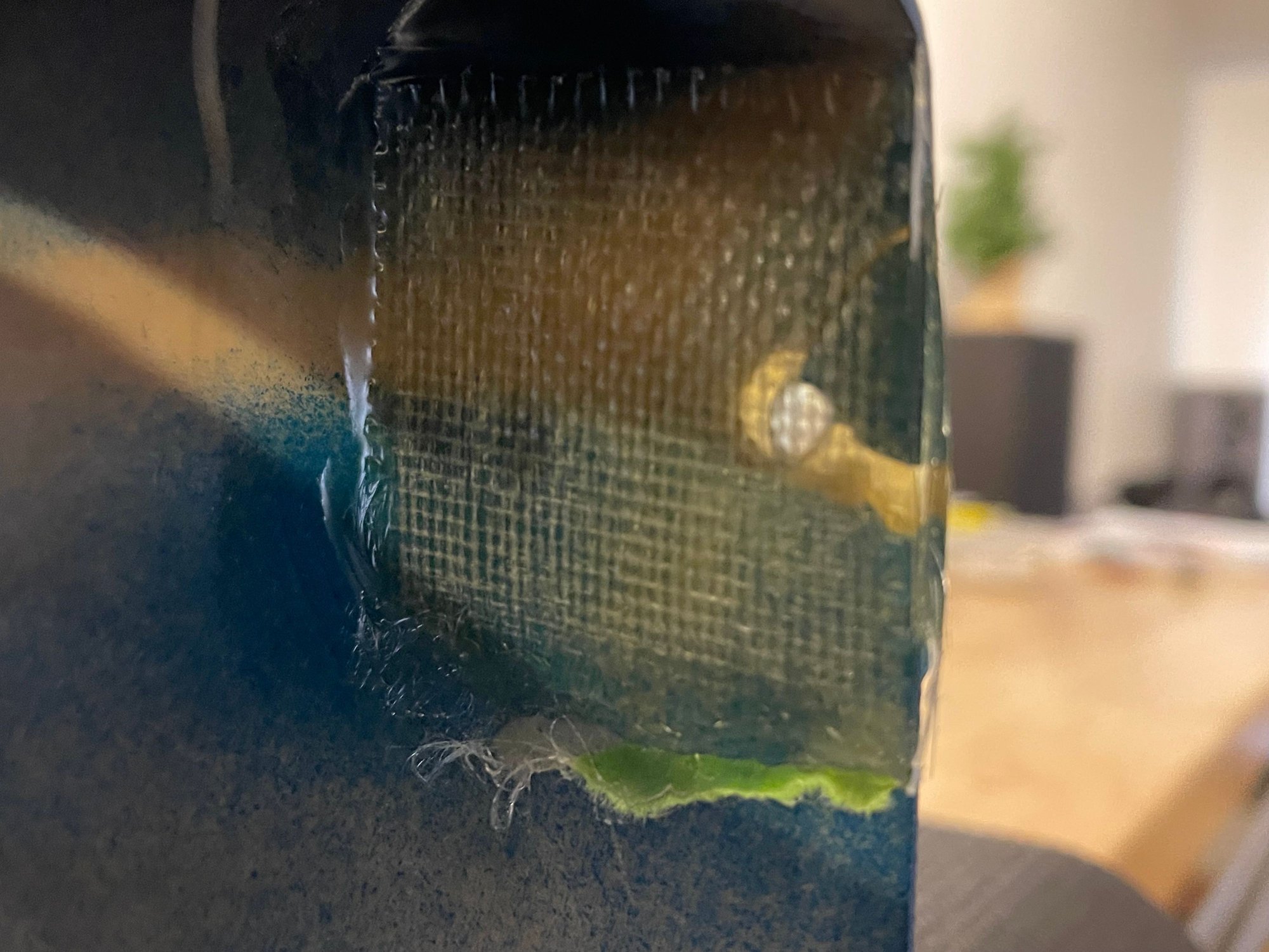 Inside, with the tape that got stuck under the resin