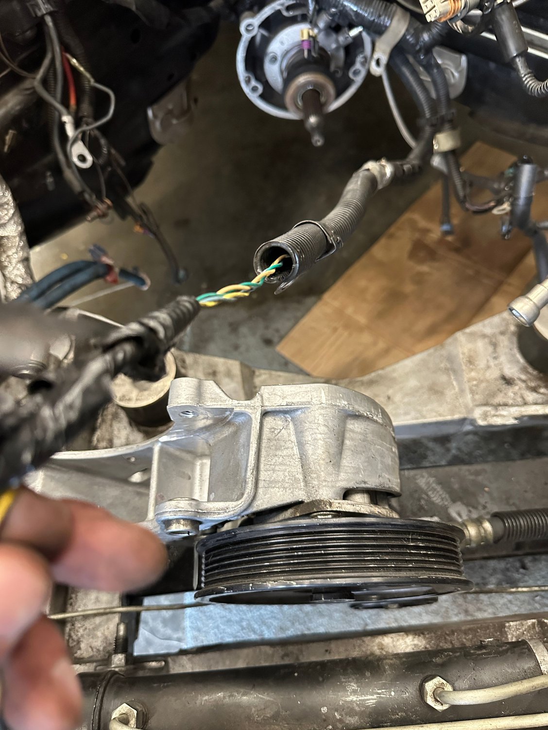 The harness is two double braided wires, look to be both green and yellow