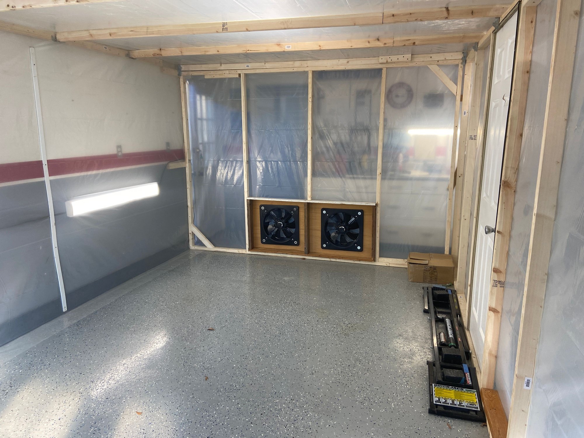 the view from the main opening.  I just stapled the plastic over the drywall on that sied of the booth. I also added 2 lights on the wall, about $10 each.