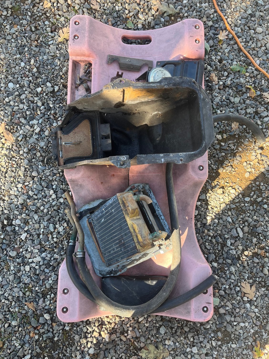 Since removing the dash to paint the windshield frame made access to the heater box a lot easier; & I knew the old heater core was leaking into the passenger compartment & needed to be replaced�