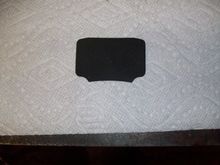 There is no glue on it. There are light indentations on one side that look like arrows point outward. 