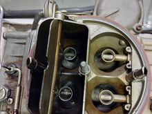 3367 air bleeds for primary and secondary bores are inside the throttle bore