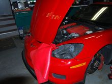 It was pretty easy to remove the lights without taking the bumper completely off.