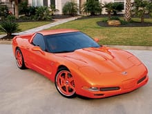0410vet 01z 2003 Chevrolet Corvette Coupe Orange Passenger Side Front View