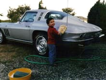 Joel preparing Daddy's '65 for his first Corvette Funfest in '01. (almost 3 yrs. old) "Joel, a clean car is a happy car!"
