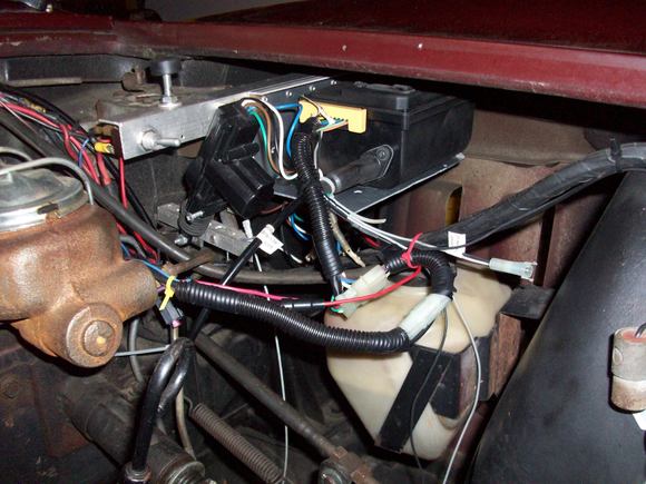 Cruise Control unit on hood latch bracket