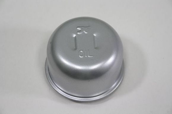 This is what a reproduction looks like, on the bottom of the cap it has a bunch of holes. Its vented