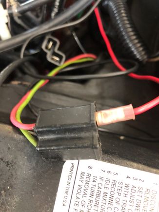 The small plug at the top of the picture is coming from the switch. The wire from the switch will reach the female plug, unless Bubba cut the wires.  The plug provides 12 volts and ground when the ignition is on.  That why my car had the electric choke connected to the plug.