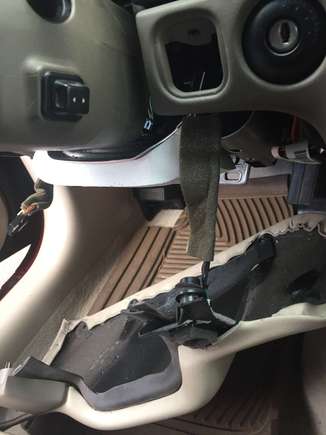 Knee bolster removed, temp sensor still connected (long wire).