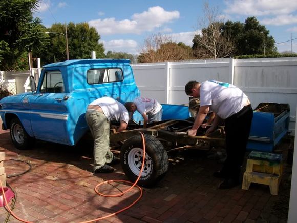 Wife & boys removing bed from the 65 truck