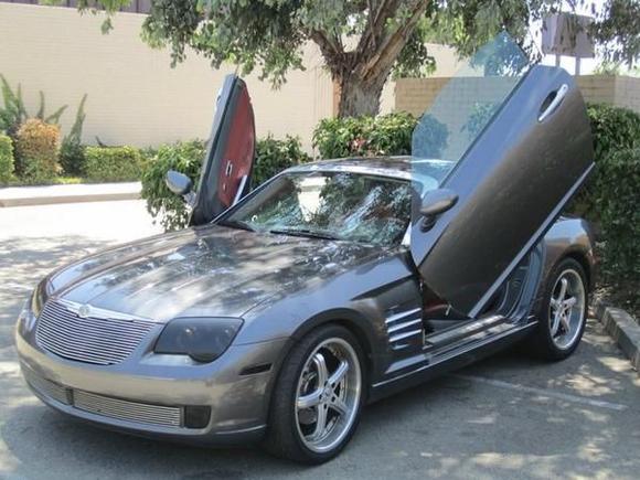 Custom grill, blacked out headlights, 19&quot; front wheels, 20&quot; rear, Borla exhaust, edelbrock ceramic brakes, konic shocks.