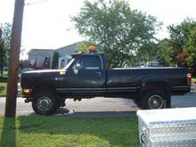 89 Dodge W350 Dually, 5.9 12V 5spd. Awesome running truck for stock. Plows stow like a tank.