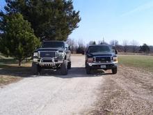 my f-250 next to my wifes old excursion both 7.3's