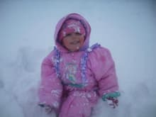 she lovesto play in the snow