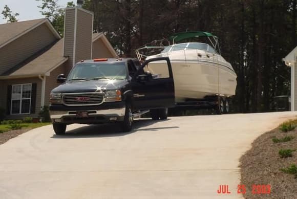 This is the main reason for the truck. I do drive the boat off the trailer and I put it back on the trailer and I am awesome at doing right the 1st time. I can back up to a dock also, so that people just hop on the platform on the back of the boat. It's a 27ft Monterey Cruiser. We live on this boat all weekend. has beds and a kitchen, and a shower,toliet. It's our life.