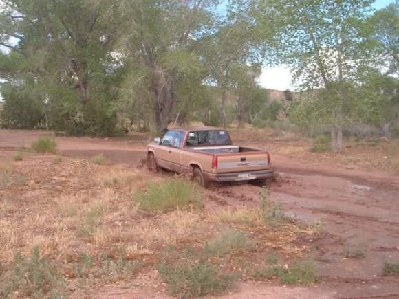 my faithfull 90 gmc playin in the mud at the dam still own this truck ever since hs but it needs a tranny right now cuz the other one is in 2 pices and 700r4 are hard to come by