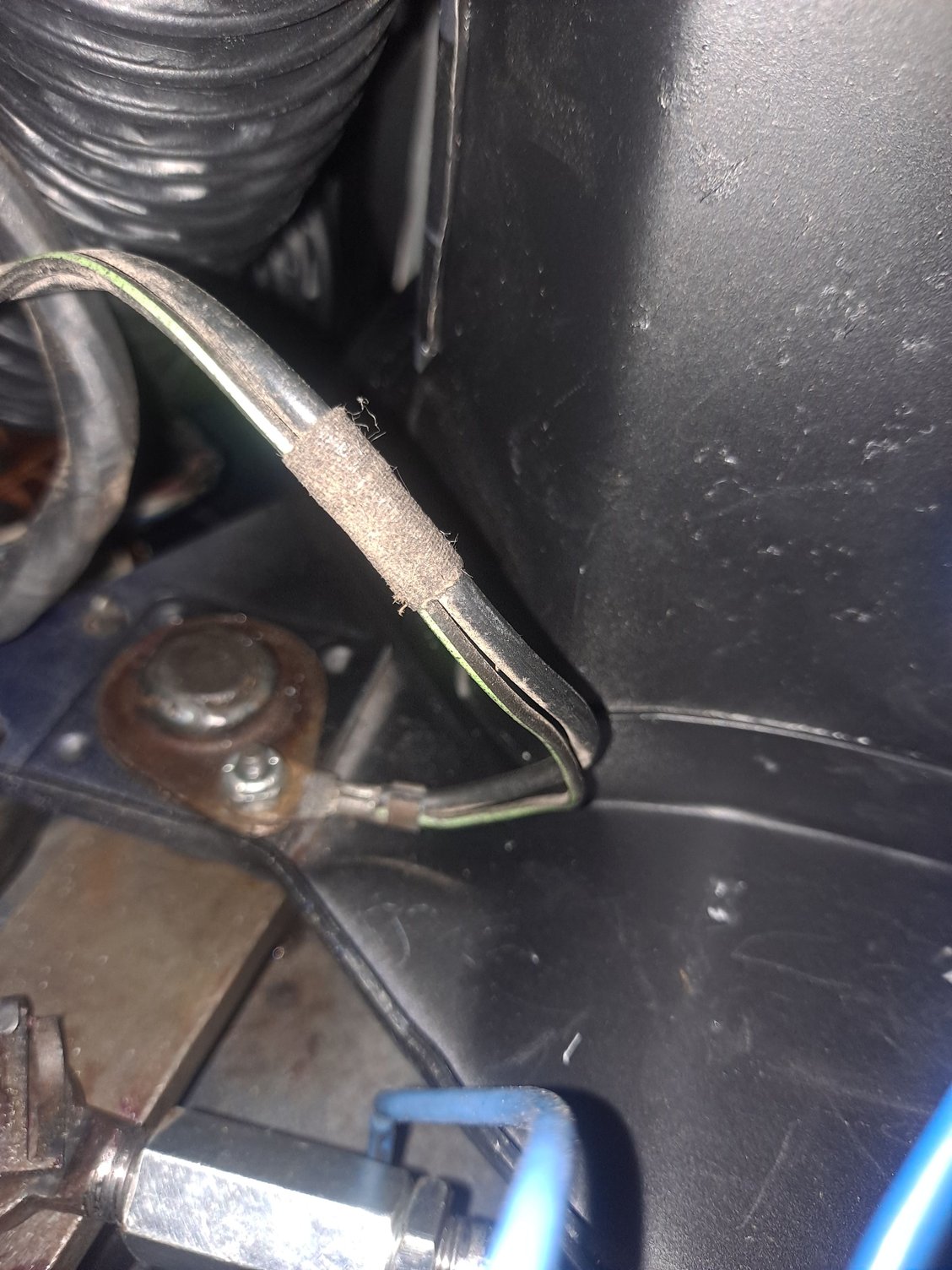 I used a 1990 dash harness in my '85 RoadTractor build.  I used the clutch/brake rod retainer for the ground attachment.