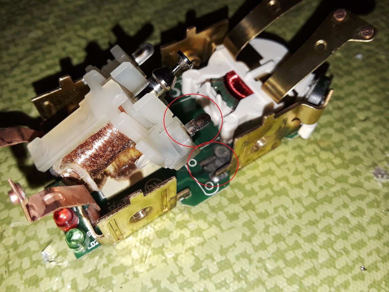 What could cause a GFCI to fail this way? Pictures included