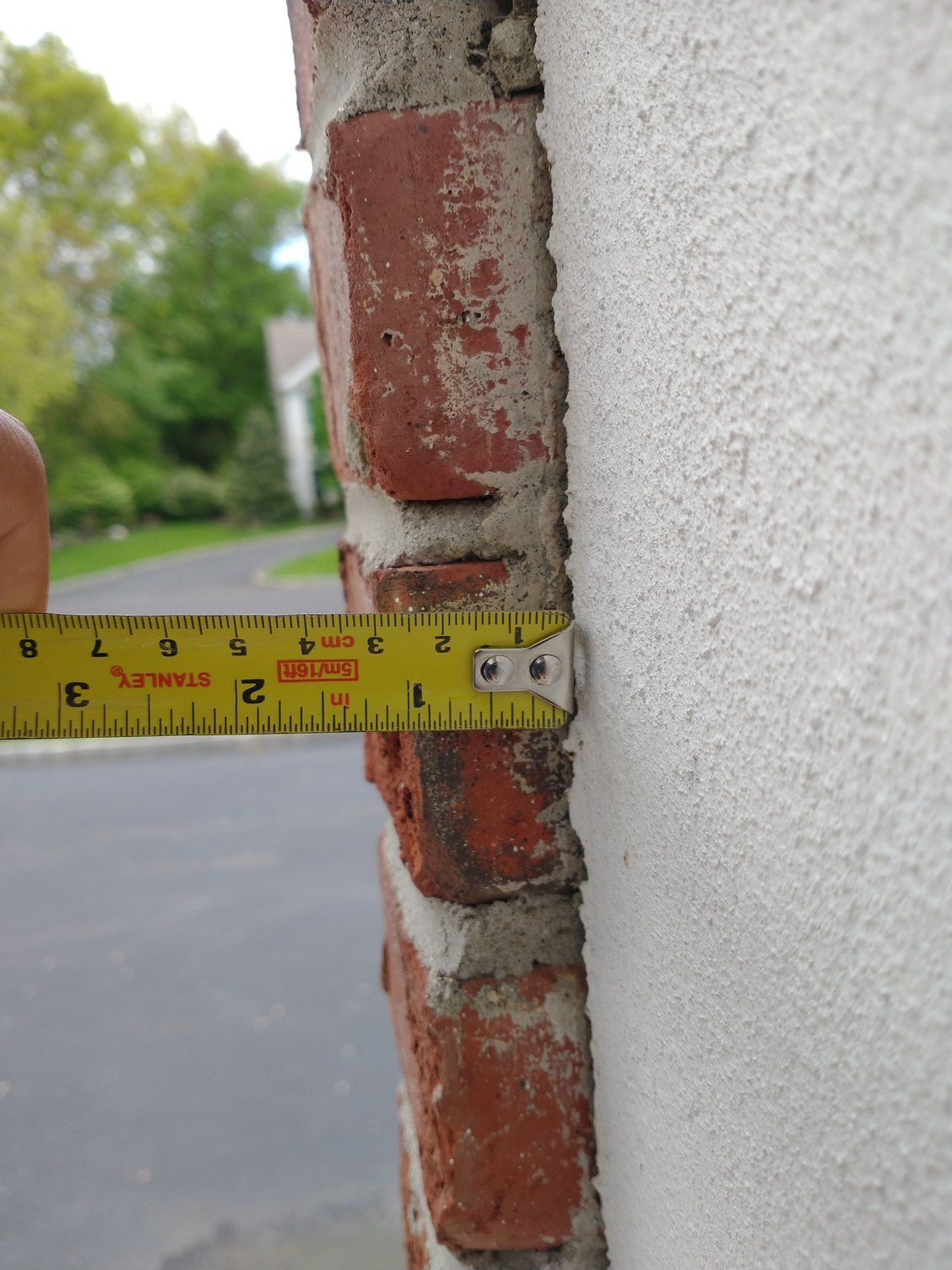 Upgrading stucco around front door entryway to more modern look