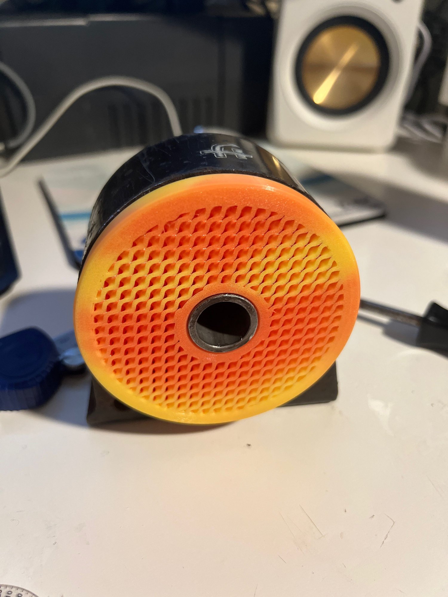 this is the assembled engine mount with the sleeve and the housing you can see how the filament is color changing the parts in yellow where I touched