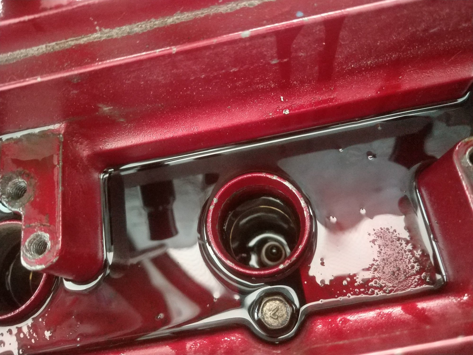 Oil in spark plug chamber. EvolutionM Mitsubishi Lancer and Lancer