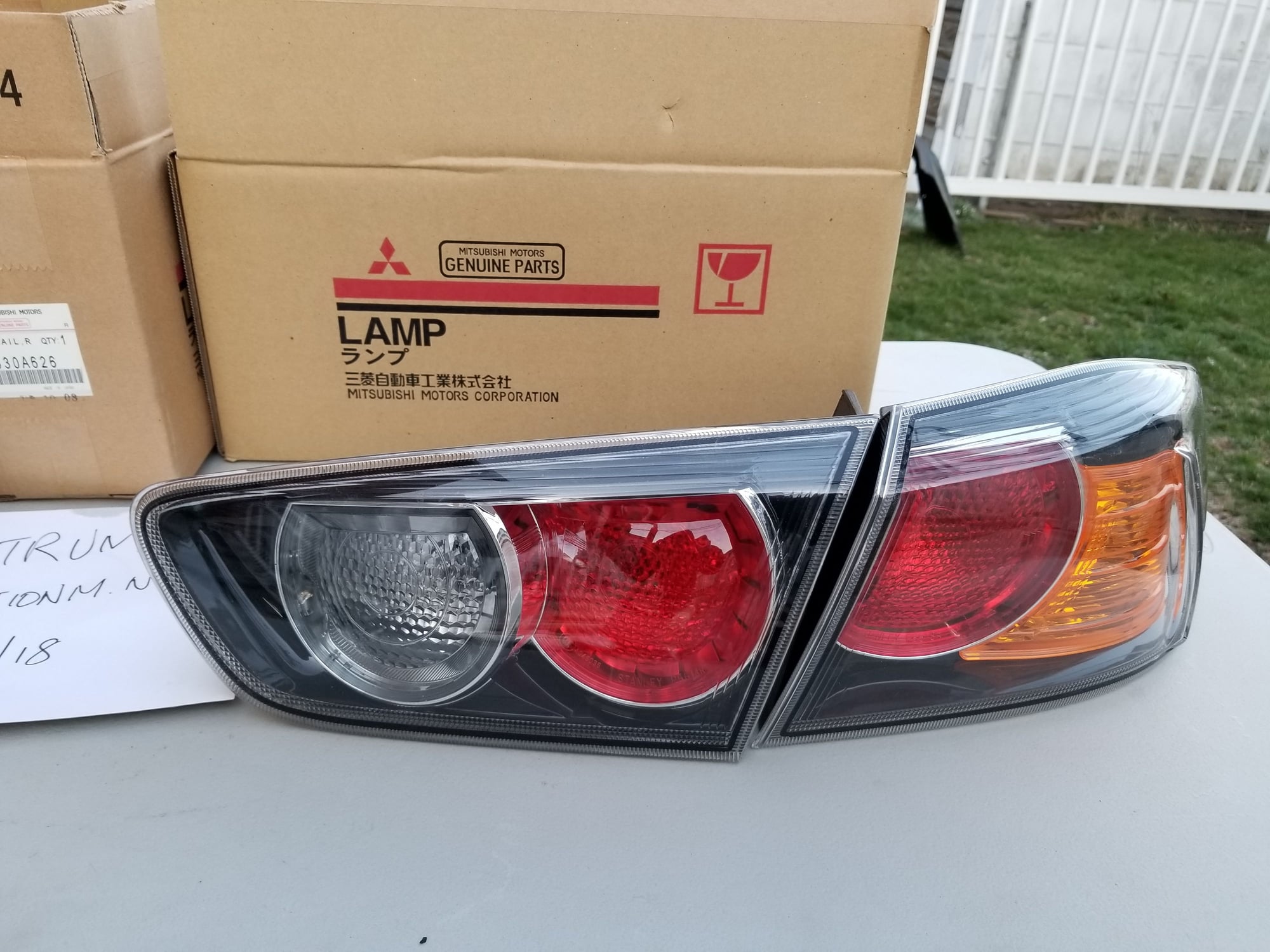 Exterior Body Parts - FS: Mitsubishi OEM Ralliart tail lights/ Brand New set of OEM Rear trunk emblems - Used - 2008 to 2015 Mitsubishi Lancer Evolution - Brooklyn, NY 11211, United States