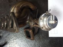 T3 tubular  manifold  with tial 38mm wastegate, Garrett 3071 ball bearing turbo,02 housing 1700. More pictures  below