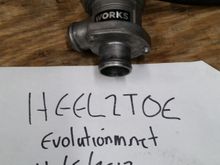 WORKS IX Metal Diverter Valve. This is based off the IX valve but has been modified to their specs and is supposed to hold over 30PSI. I cant get it to hold over 27PSI without it cracking open. With that being said it works fine just and is pretty much inline with a stock IX valve if not very slight additional holding power. $100